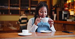 Black woman, cafe and smile with drinking coffee on break, enjoy and relax from work. Female person, restaurant and satisfied customer with tea on lunch to rest, peace and calm for wellness or care