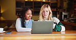 Talking, friends and women in coffee shop with laptop for university, group project or scholarship. Students, online and people with computer for education, knowledge or studying in restaurant