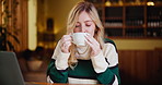 Woman, laptop and enjoying coffee at cafe as freelancer for remote work, drink and relax. Female person, restaurant and tea with aroma for fresh or warm beverage as journalist or blogger for website