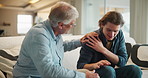 Empathy, sad or support with father and son on sofa in living room of home together for bonding. Grief, love or loss with old man talking to teenager in apartment for advice, help or trust as family