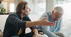 Sofa, father and frustrated son and watching tv with sports, game and disappointment together in home. Television, dad and sad adult child on couch with football, soccer ball and angry in living room