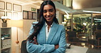 Happy, business woman and night with confidence for career profession, ambition or mindset at office. Portrait of young female person or employee with smile for fashion, style or pride at workplace