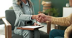 Handshake, documents and couple with finance consultant for budget, financial review and mortgage. Paperwork, marriage and people shaking hands for agreement for insurance, investment and tax savings