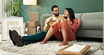 Happy, couple and home or relax with boxes, coffee and people on floor in new house or bonding for relationship. Apartment, together and living room or smile for mortgage, relocation and moving