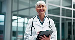 Tablet, woman and face of mature doctor in hospital for research on treatment, diagnosis or cure. Smile, career and portrait of female medical worker with digital technology for telehealth in clinic.