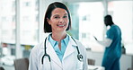 Doctor, face and job in health facility with experience for wellness, healthcare and research. Mature woman, smile and happy in hospital as medical consultant for cardiology, medicine or patient care