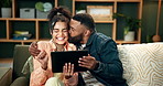 Happy, kiss and couple on sofa with tablet excited for news, feedback or house loan approval. Digital, ecommerce and people celebrate in living room online for home renovation, plan or mortgage deal