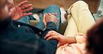 Couple, people and home with holding hands on sofa from above with conversation or discussion. Love, relationship and support for help, trust and care as soulmate with empathy and respect together