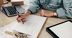 Woman, hands and writing with clipboard for inventory, checklist or checking stock in logistics on desk. Closeup of female person or business owner filling form for shipment, distribution or boxes