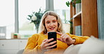 Happy, relax and woman with phone on sofa for online chatting, communication and networking. Home, apartment and person on smartphone for social media, funny website and internet joke in living room