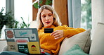 Woman, laptop and sofa with credit card for online shopping, banking or transaction at home. Female person or shopper with debit on computer for ecommerce, fintech or purchase in living room at house