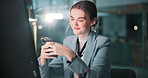 Happy woman, night and typing with phone for business discussion, conversation or social media at office. Female person or employee working late on mobile smartphone for online chatting or texting