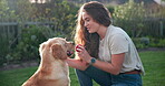 Ball, woman and play with dog in backyard for game freedom, training and learning obedience by running in outdoor together. Female person, animal and pet with love, bonding and friends in nature