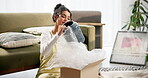 Woman, happy and boxes with ornament in home or new house for moving in with furniture. Female person, ownership and smile gift or present and package with unboxing or unpacking and delivery