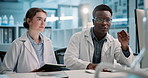 Science, team and discussion on computer in laboratory for training on data analysis and pharmaceutical research. Scientist, intern and expert knowledge on medical problem solving or medicine support