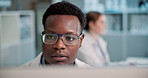 Scientist, man and reading on computer in laboratory for medical research or pharmaceutical results with glasses. Black professional, science expert or review on study report or medicine update on pc