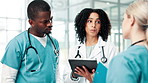 Tablet, doctors and group in discussion in meeting for healthcare, brainstorming ideas and training nurses. Teamwork, medical people and planning on technology for collaboration in hospital clinic