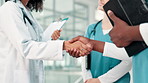 Nurse, doctor and shaking hands for healthcare meeting, support and welcome with introduction to staff. Medical people with group handshake for teamwork, hello or onboarding in hospital or clinic