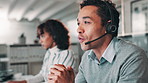 Businessman, consultant and call center with headphones for customer service or support at office. Young man, agent or employee talking or consulting with mic for online advice, help or telemarketing