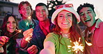 Sparklers, selfie or happy people in outdoor celebration with lights, party or pictures in night on new years. Photo, face or excited friends in urban city together with smile, fun fireworks or glow