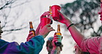 Hands, toast and friends in outdoor celebration with drinks, beer or alcohol for reunion, event or youth culture. Group, low angle and people in party with cheers or cups for fun social gathering