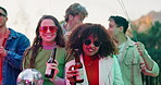 Outdoor, dance and friends in party with smile, beer or reunion for memory, event or youth culture. Singing, women and happy people in group celebration with alcohol or drinks for social gathering 