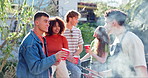 Barbecue, drinks and friends in backyard for party, break and weekend reunion, conversation and bonding. Smoke, food and people outdoor for birthday, celebration or vacation, bbq or hangout together