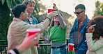 Backyard, dancing and friends in party with toast, beer or reunion for memory, event or youth culture. Disco ball, fun or happy people in group celebration with alcohol or drinks for social gathering