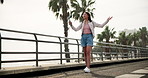 Selfie, Brazilian woman on beach and walk with smile, summer holiday or tropical island for live stream. Photography, social media and happy influencer girl, ocean vacation or blog post on promenade