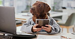 Office, business and dog on laptop with smartphone or documents for browsing internet, online and email. Funny, mimic and comic as animal on suit in desk at workplace in desk and cheerful for news