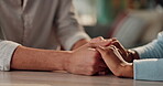 Empathy, love and support with hands of friends in home for grief, loss or pain together. Anxiety, depression or mental health with people closeup at table in apartment for hope, prayer or trust