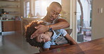 Dad, love and calming daughter in home with sensory overload or adhd child with overstimulation. Care, patience and emotional freedom technique with pressure massage or movement for comfort exercises