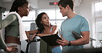 Personal trainer, women and clipboard with talking in gym for support, sign up or planning of workout with info. Fitness coach, paperwork or people for exercise, checklist or recruitment for wellness