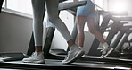 Woman, runners and legs with treadmill for exercise, training or cardio workout together at gym. Closeup of female person, feet or shoes walking on machine for weight loss or fitness at health club