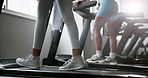 Woman, runners and legs with treadmill for workout, training or cardio exercise together at gym. Closeup of female person, feet or shoes walking on machine for weight loss or fitness at health club