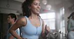 Happy woman, runner and personal trainer with treadmill for workout, training or cardio exercise at gym. Female person, smile and coach for running, weight loss or wellness on machine at health club