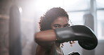 Boxing, face and woman in gym for punch, training and preparation for mma competition. Fitness center, professional and female boxer with gloves for power, energy and workout for sports challenge