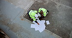 Construction, people and architect with documents in discussion for planning, teamwork and feedback. Top view, communication and contractor with paper for civil engineering, project and blueprint