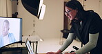 Woman, laptop and camera in studio for creative director, producer or videographer on set with model. Technology, female person or entrepreneur with artist for social media post or online blog