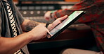 Hands, man and typing on tablet in music studio for online or internet research for lyrics as song producer. Musician, dj and artist in texting or networking for album ideas, recording and creativity
