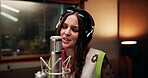 Woman, musician and singer in music studio for song recording with microphone for voice control. Female person, talent and passionate artist with headphone on singing for album or playlist and audio