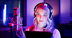 Woman, musician and headphones with tablet in studio for music production, media streaming and search in neon. Artist, singer and entertainment industry with digital app for song lyrics and learning