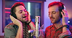 Music, production and people with singing in studio for entertainment, recording and sound media. Artist, headphones and musician in neon with microphone for audio, broadcast or collaboration on song
