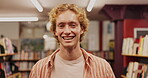 Man, portrait and happy university student in library with pride for education, progress and results. Learner, campus and smile or satisfied in confidence with book for research, knowledge or info