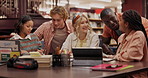 Students, college and discussion with greeting at library for communication, learning or knowledge. Education, diversity and friends with technology for school project, people and study group