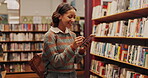 Internet, happy and girl with phone in library for social media, contact and funny notification. Student, laughing and person with technology at academy for education, campus gossip and online post