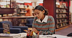 Stress, phone and woman student in library networking on internet, mobile app or social media. Anxiety, technology and female person read university email for scholarship mistake on cellphone.