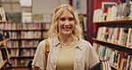 Student, girl and face with books in library for studying, literature research and learning for knowledge. Gen z, portrait and happy for education with backpack, scholarship and academic information