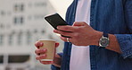 Person, hands and typing with phone or coffee in city for outdoor communication or social media. Closeup of user on mobile smartphone with drink for online chatting, texting or app in an urban town