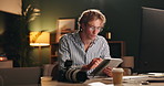 Night, office and man with tablet for editor, photographer or online design with tech, software or scroll. Computer, photography or editing with digital app for creative research, production or ideas
